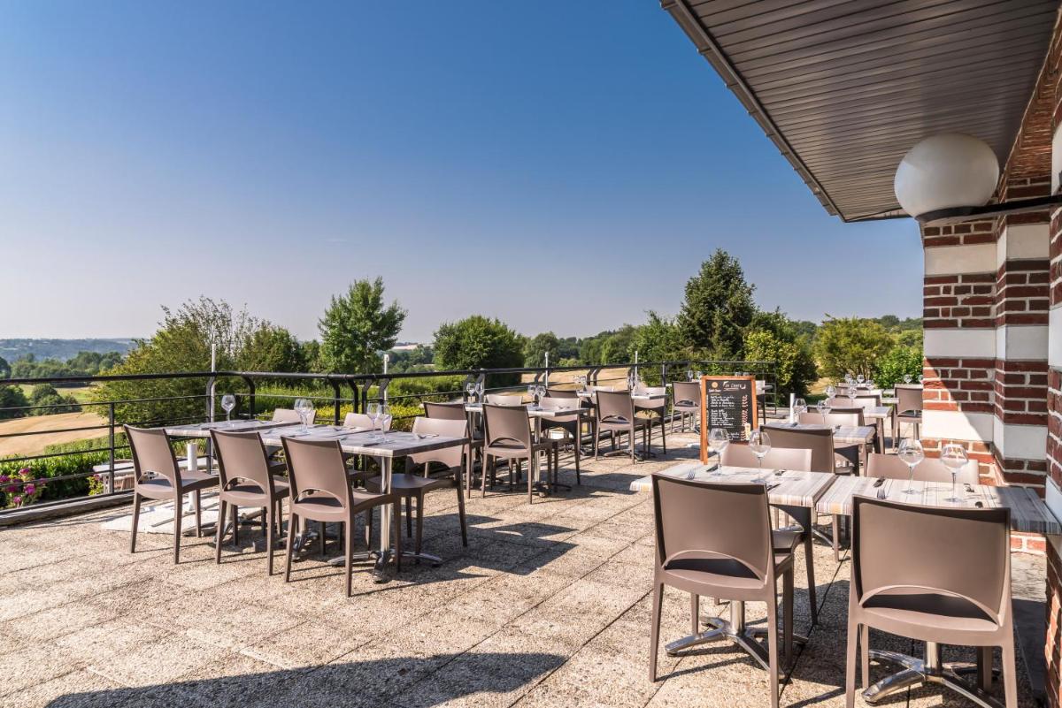 Restaurant ou autre lieu de restauration dans l'établissement Hôtel du Golf