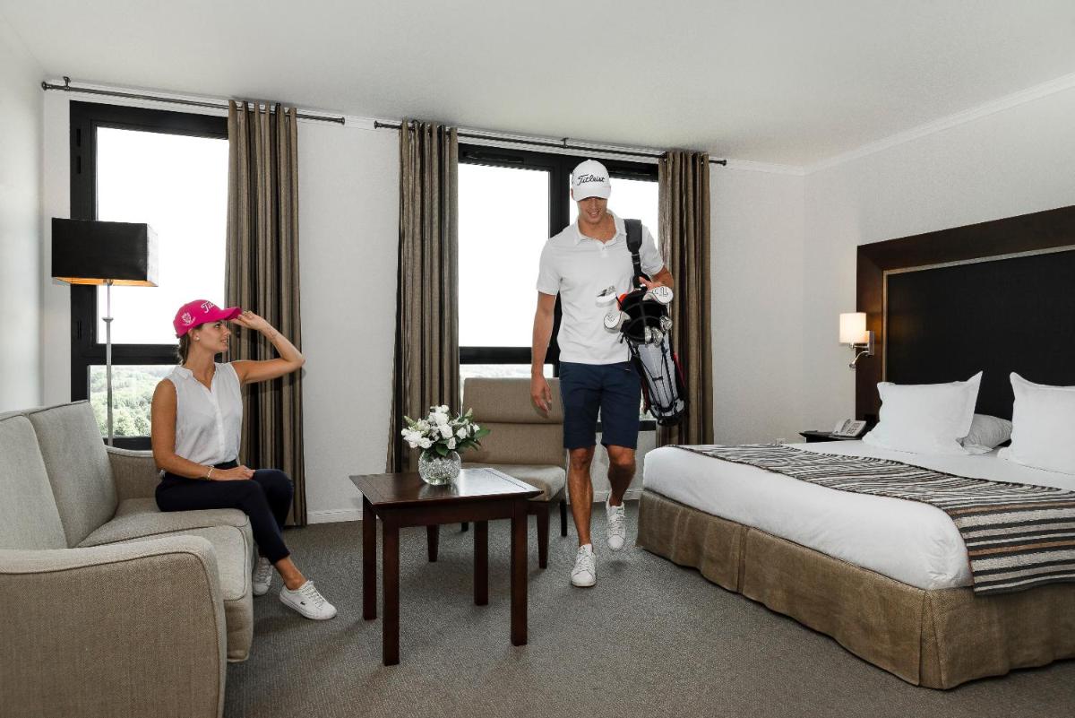 Un ou plusieurs lits dans un hébergement de l'établissement Hôtel du Golf
