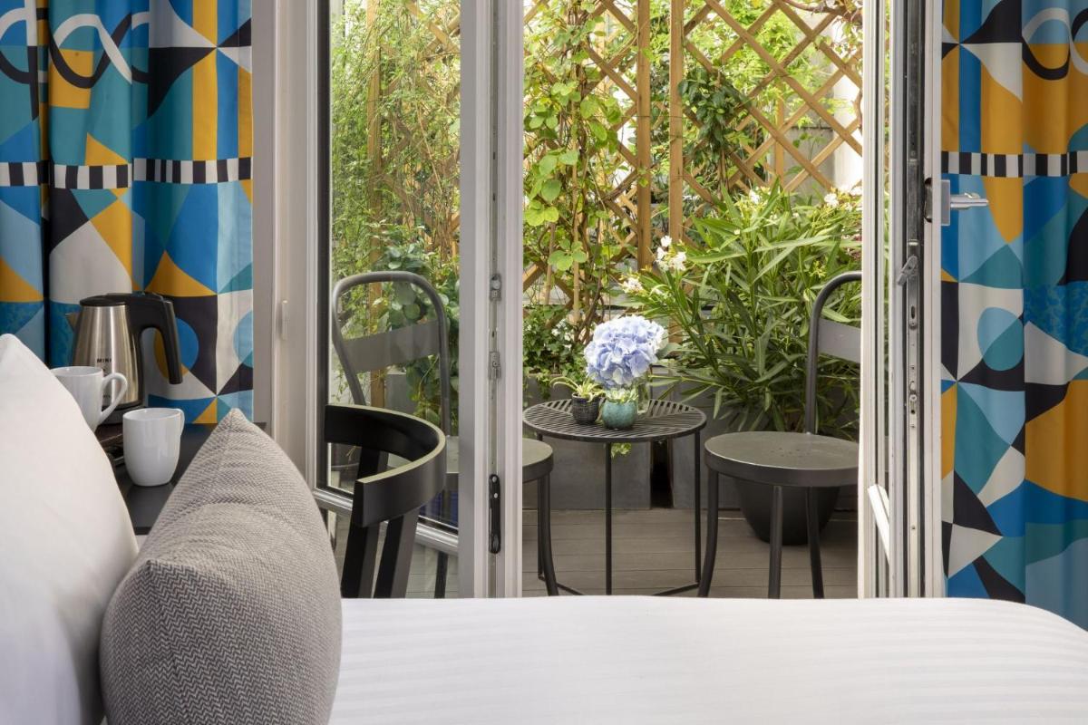 Coin salon dans l'établissement Les Matins de Paris & Spa