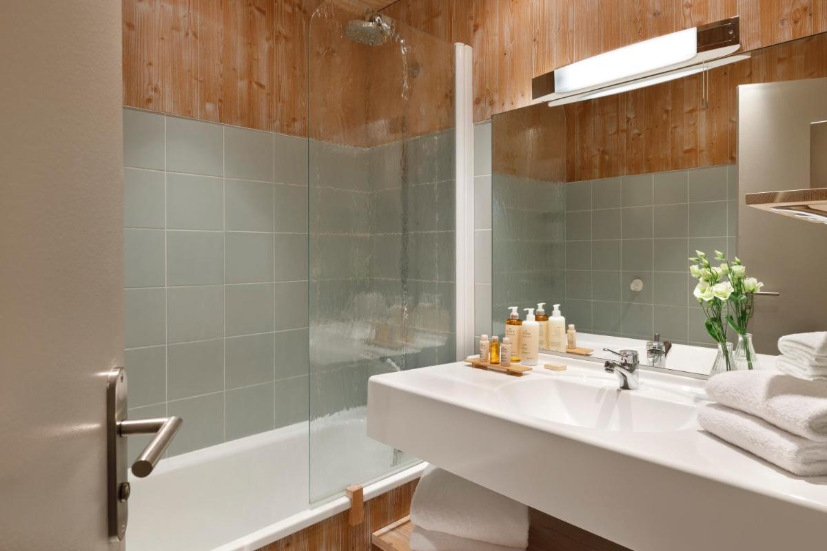Salle de bains dans l'établissement Ours Blanc Hotel & Spa