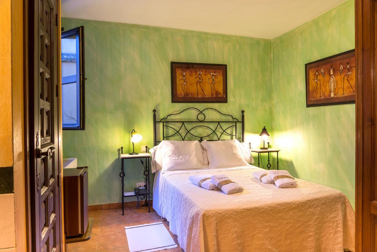 Cama o camas de una habitación en Hotel Spa La Casa del Rector Almagro