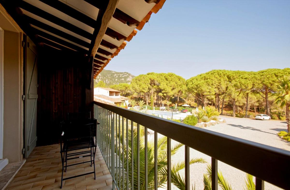 Balcon ou terrasse dans l'établissement Auberge Val Moureze Hôtel & Spa