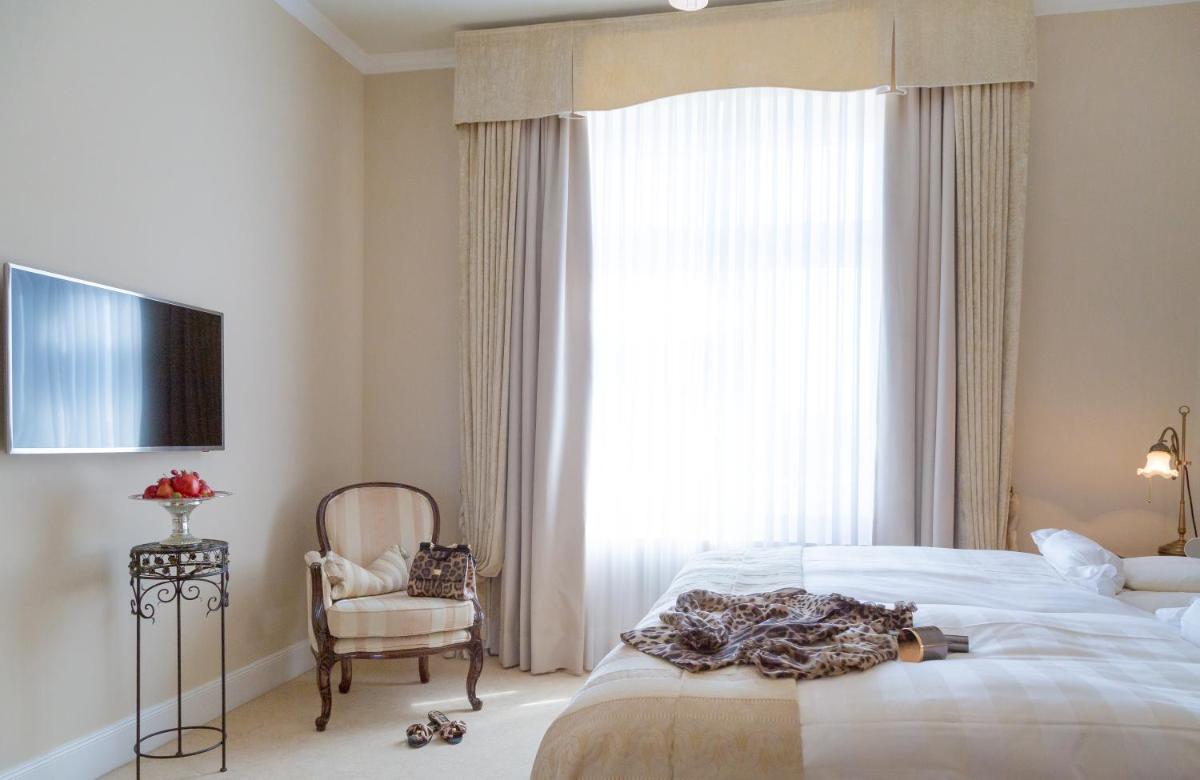 Ein Bett oder Betten in einem Zimmer der Unterkunft Hotel Miramar