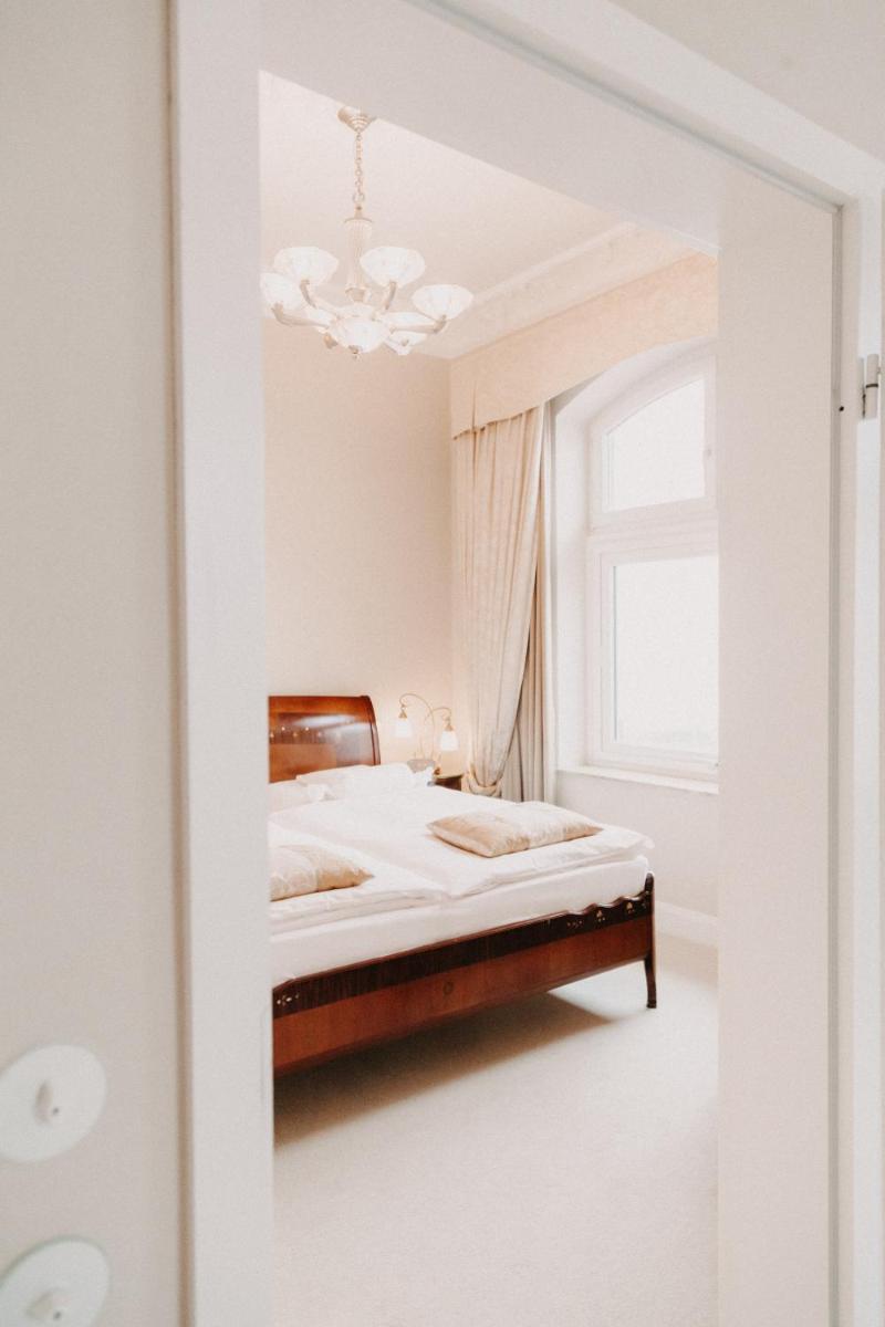 Ein Bett oder Betten in einem Zimmer der Unterkunft Hotel Miramar