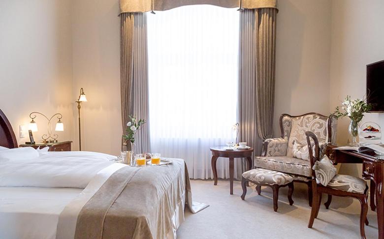 Ein Bett oder Betten in einem Zimmer der Unterkunft Hotel Miramar