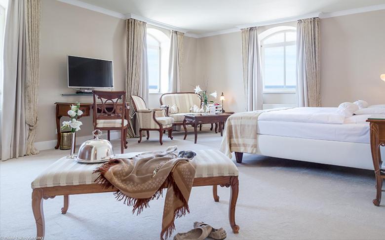 Ein Bett oder Betten in einem Zimmer der Unterkunft Hotel Miramar