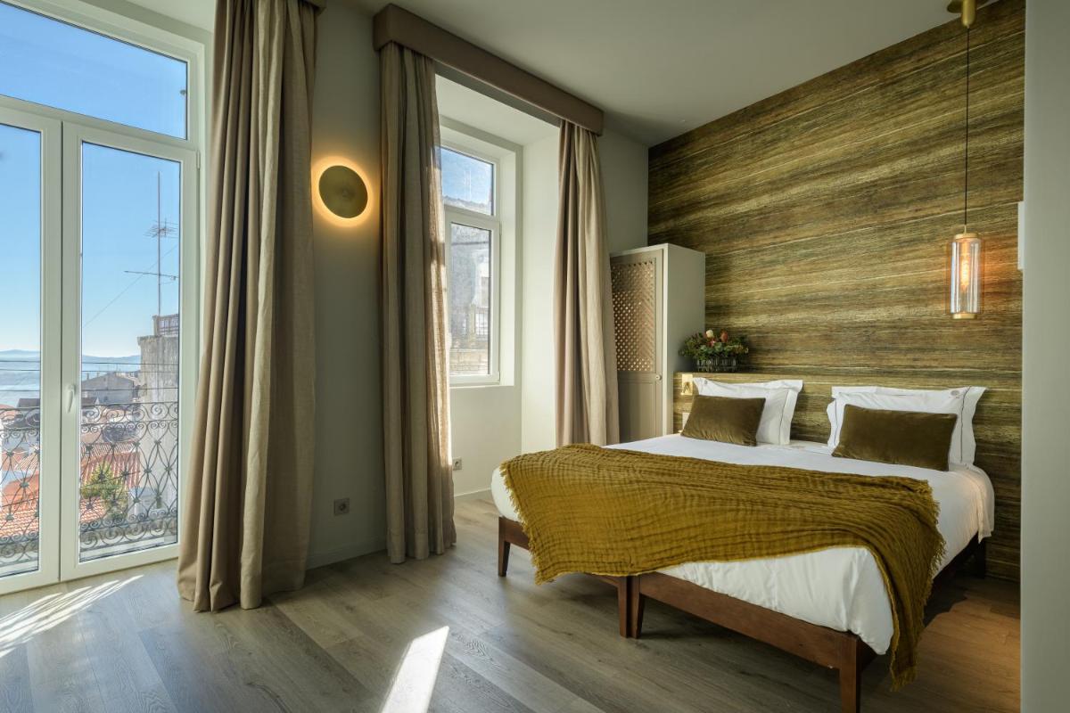 Uma cama ou camas num quarto em Pena D'Água Boutique Hotel & Villas