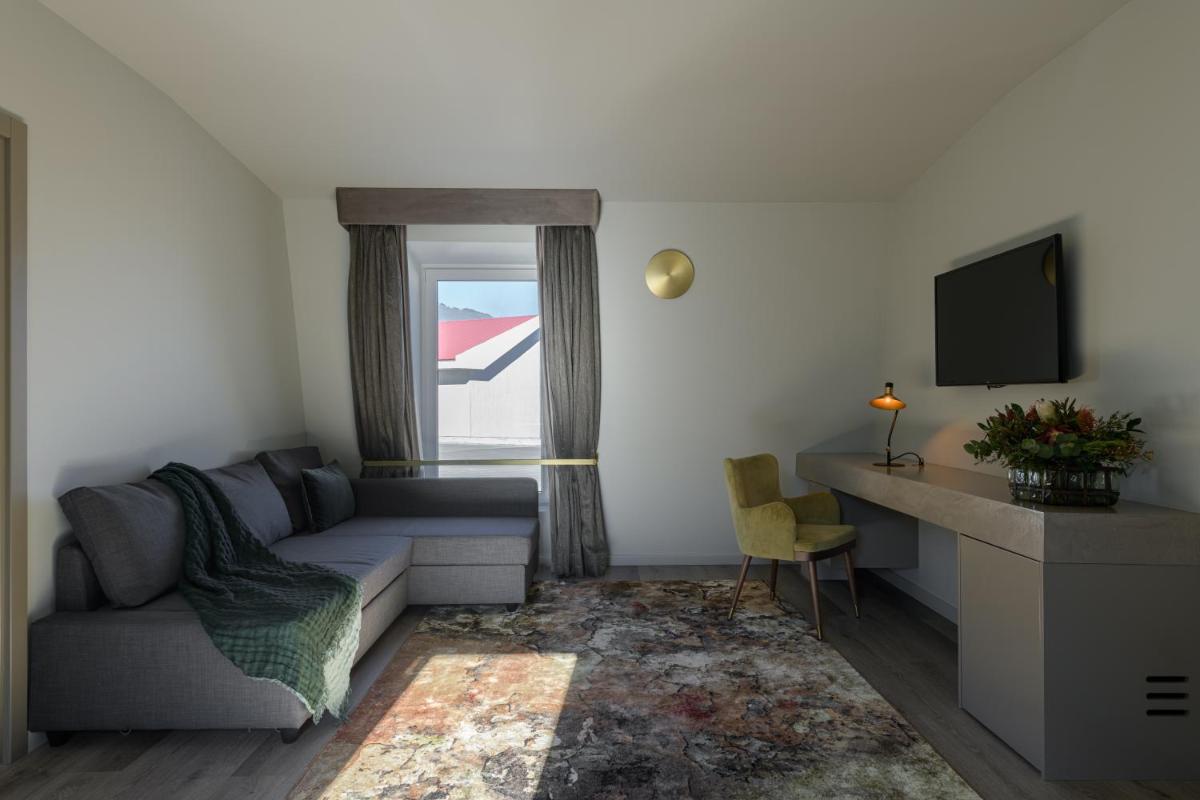 Uma televisão e/ou sistema de entretenimento em Pena D'Água Boutique Hotel & Villas