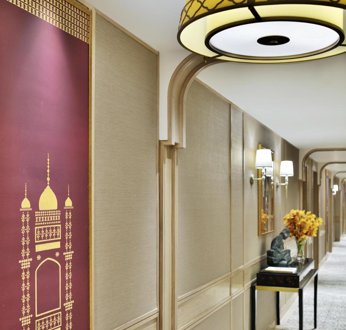 a hallway with a wall mural of a mosque at Taj Mahal, New Delhi in New Delhi