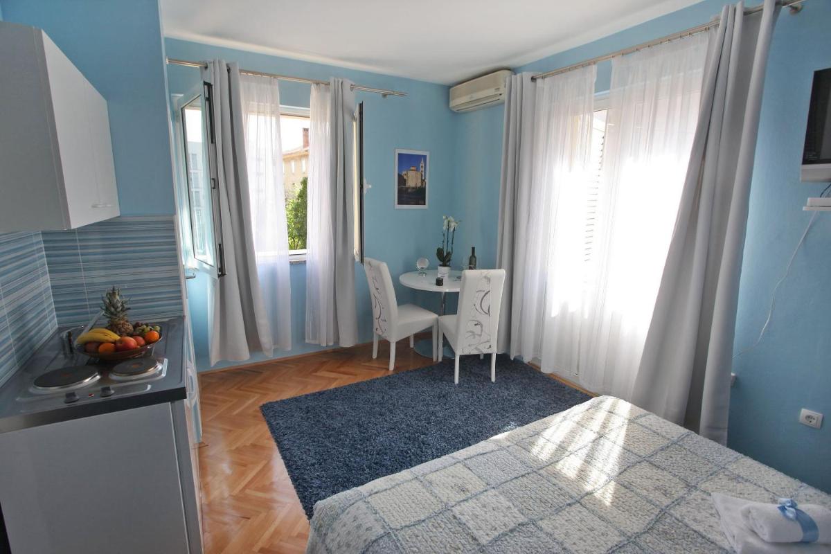 Apartments & Rooms Andrea - Housity