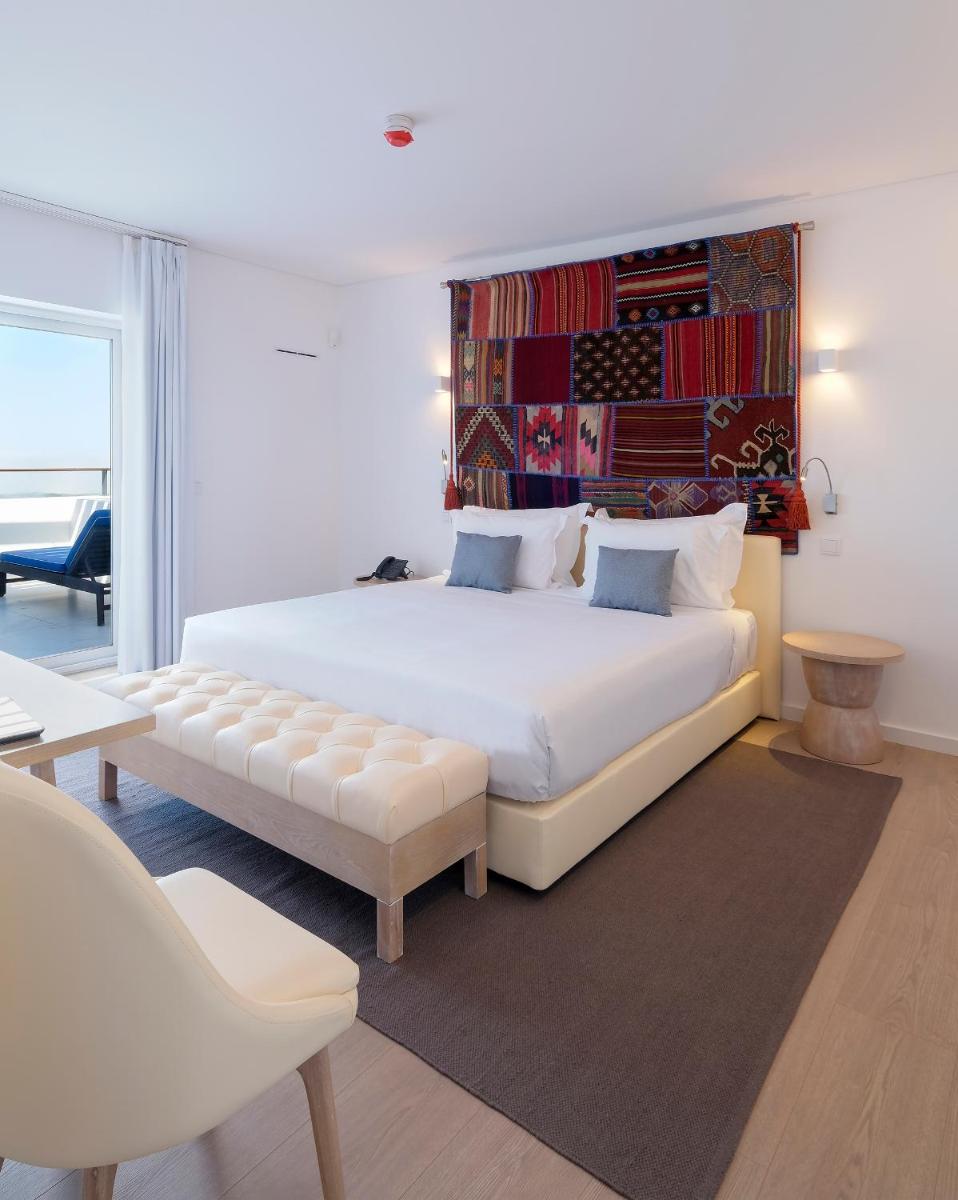 Uma cama ou camas num quarto em Royal Obidos Scenic Resort
