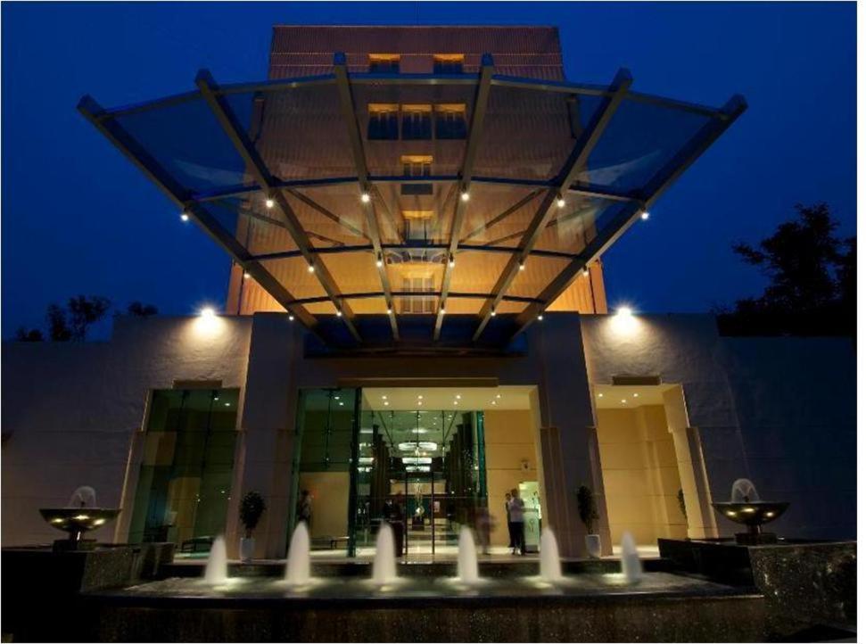 a building with a water fountain in front of it at Blue Diamond Pune IHCL SeleQtions in Pune
