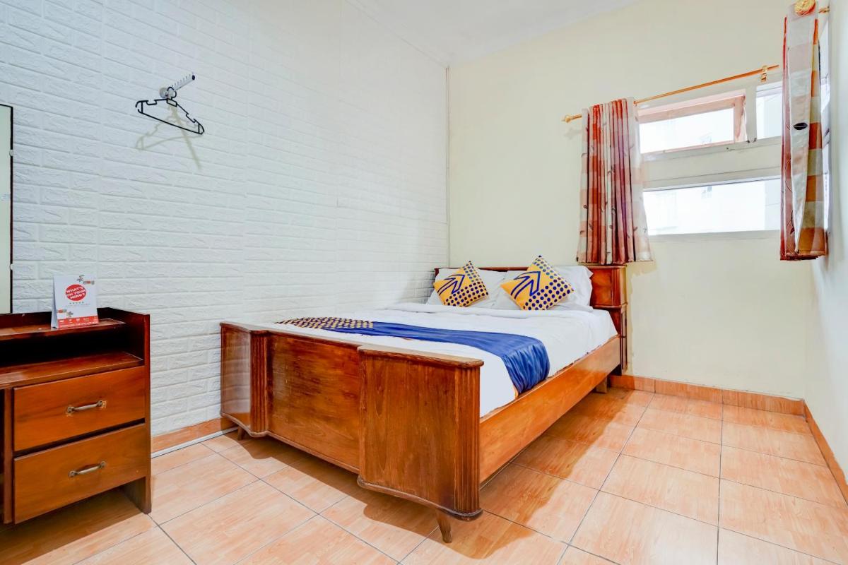 Radio Backpacker Guesthouse Syariah - Housity