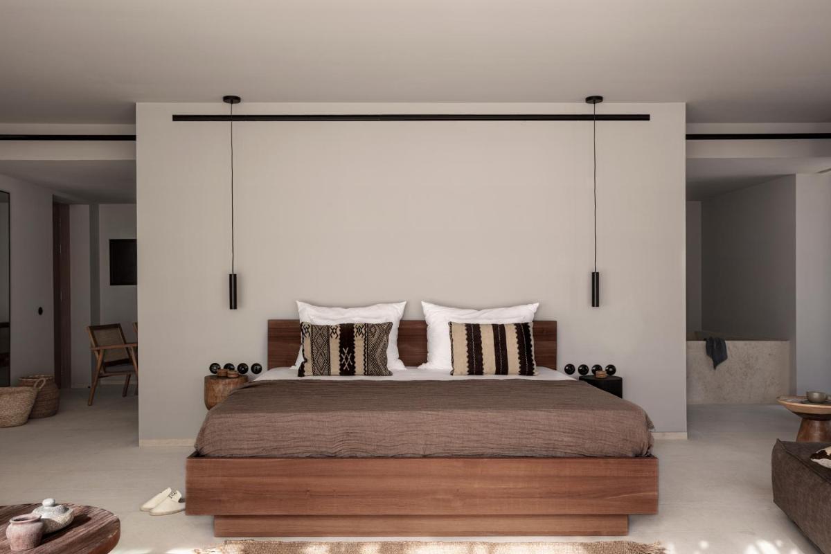 Cama o camas de una habitación en OKU Ibiza