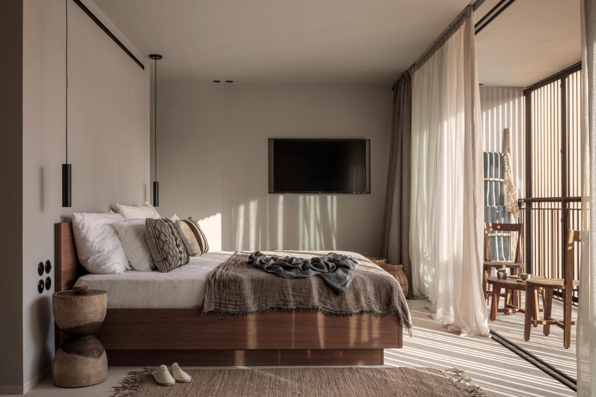 Cama o camas de una habitación en OKU Ibiza