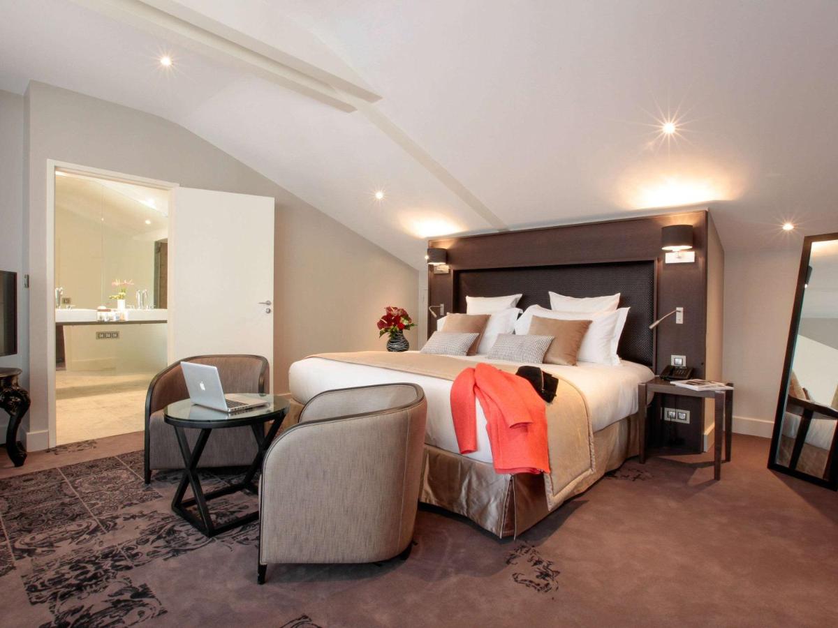 Un ou plusieurs lits dans un hébergement de l'établissement La Cour des Consuls Hotel & Spa Toulouse - MGallery Collection
