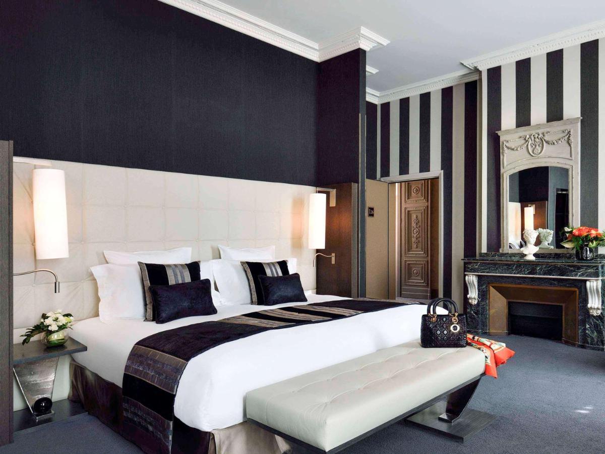 Un ou plusieurs lits dans un hébergement de l'établissement La Cour des Consuls Hotel & Spa Toulouse - MGallery Collection