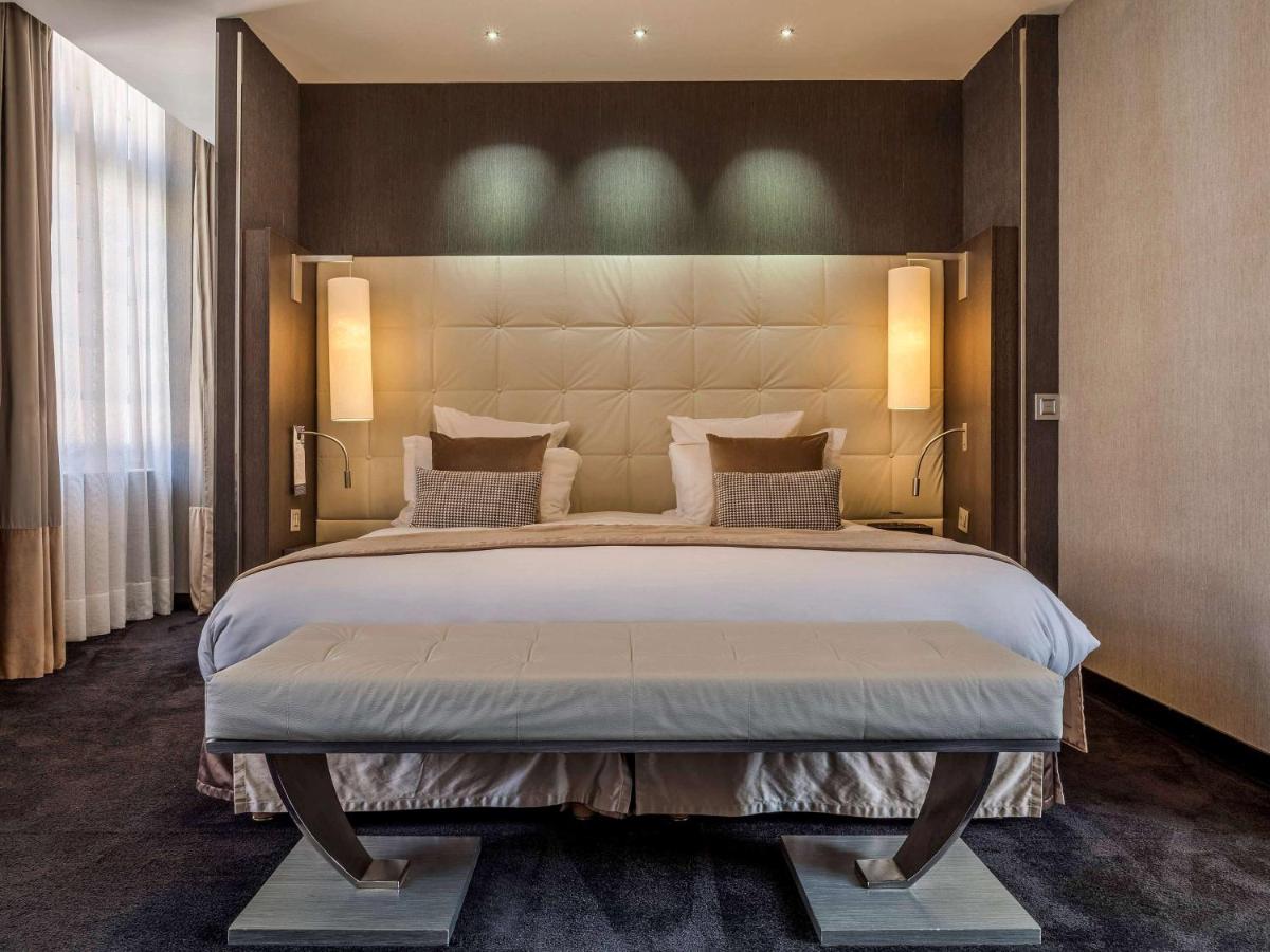 Un ou plusieurs lits dans un hébergement de l'établissement La Cour des Consuls Hotel & Spa Toulouse - MGallery Collection