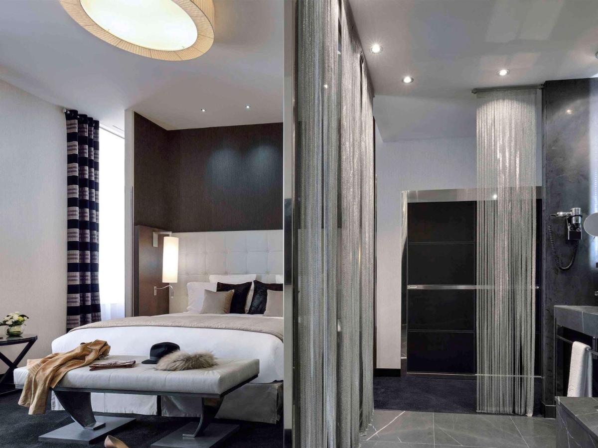 Un ou plusieurs lits dans un hébergement de l'établissement La Cour des Consuls Hotel & Spa Toulouse - MGallery Collection