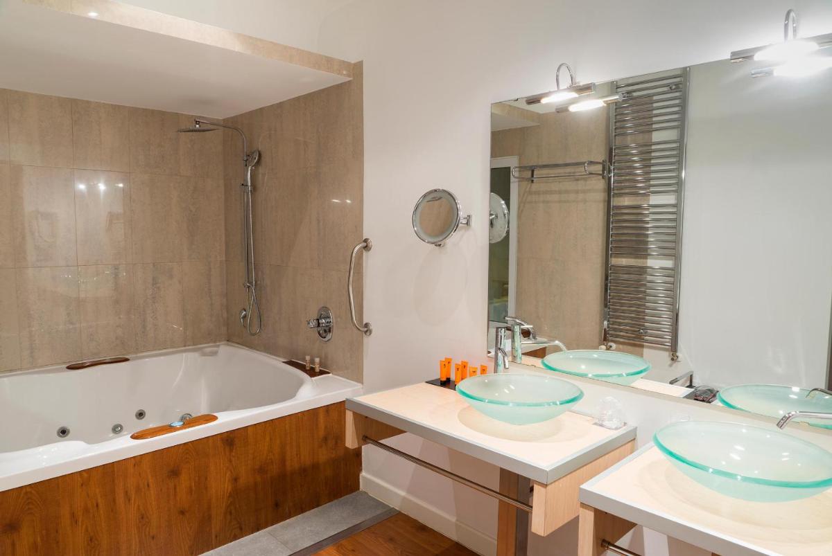 Un baño de Hotel Spa La Casa del Rector Almagro