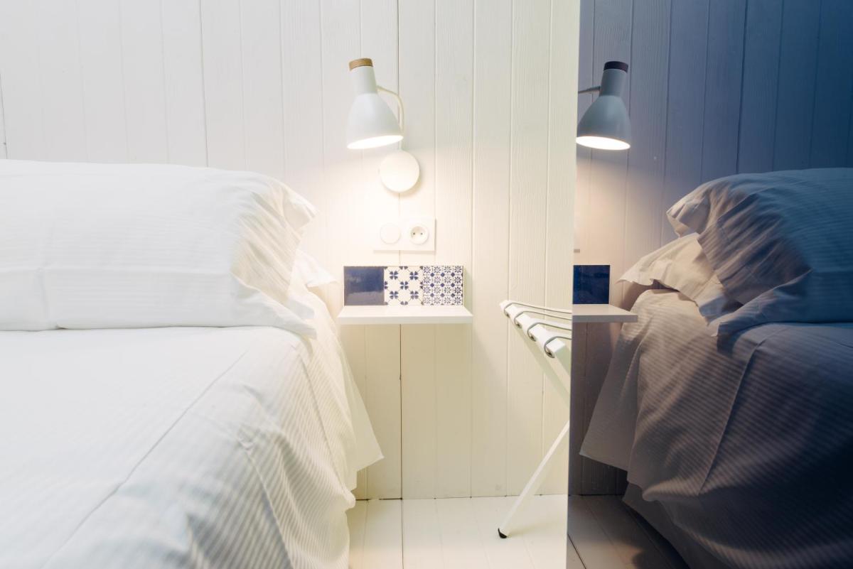 Un ou plusieurs lits dans un hébergement de l'établissement Atypik Hotel