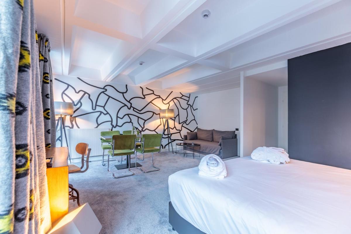 Un ou plusieurs lits dans un hébergement de l'établissement Totem, Friendly Hotel & Spa