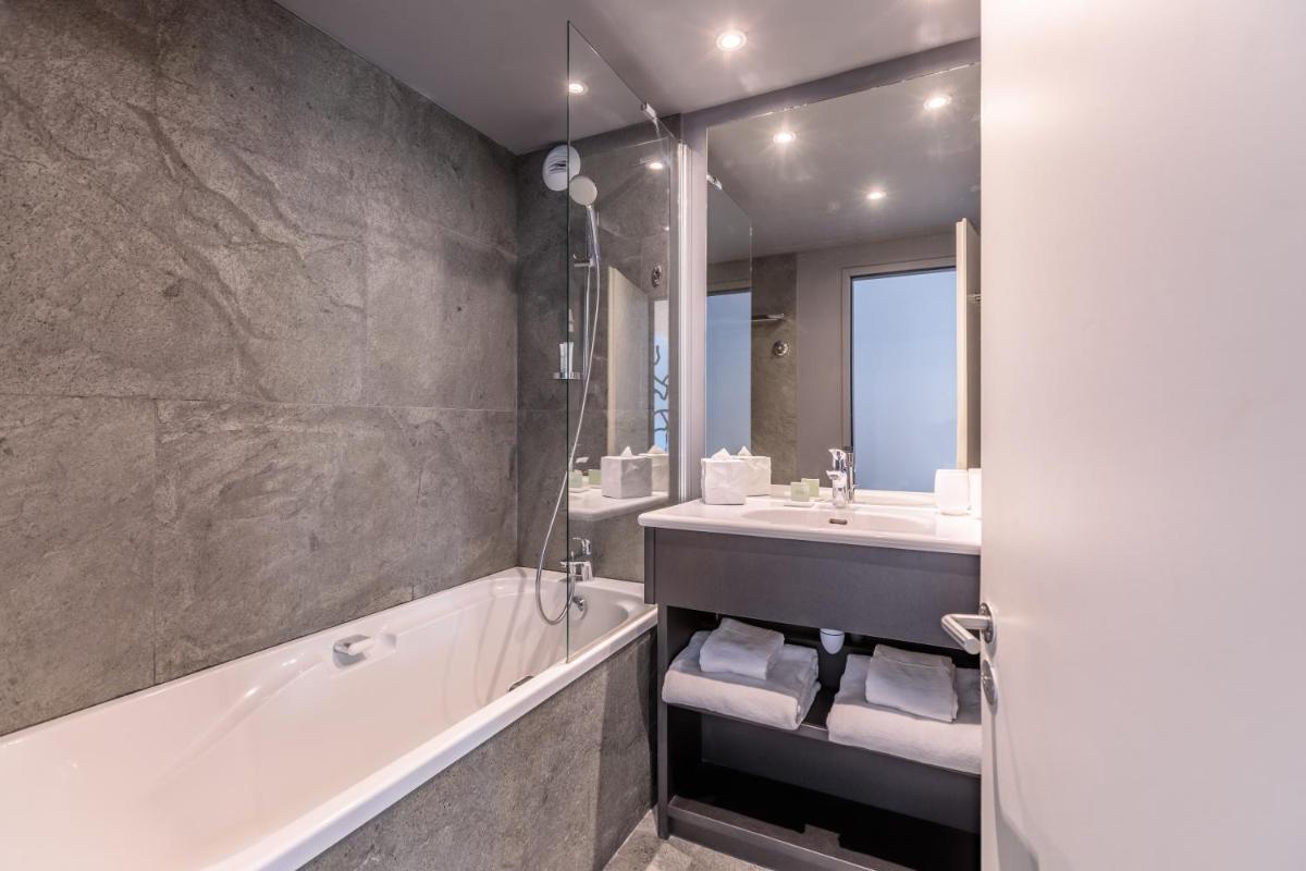 Salle de bains dans l'établissement Totem, Friendly Hotel & Spa