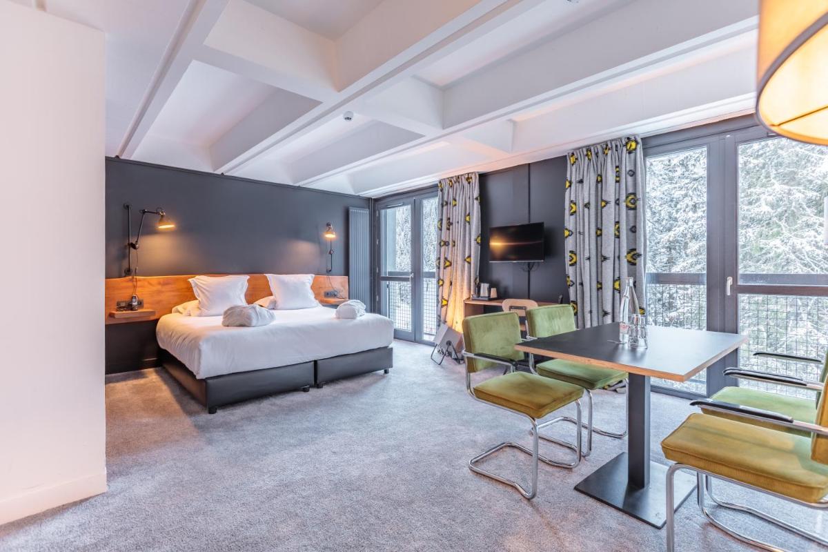 Un ou plusieurs lits dans un hébergement de l'établissement Totem, Friendly Hotel & Spa