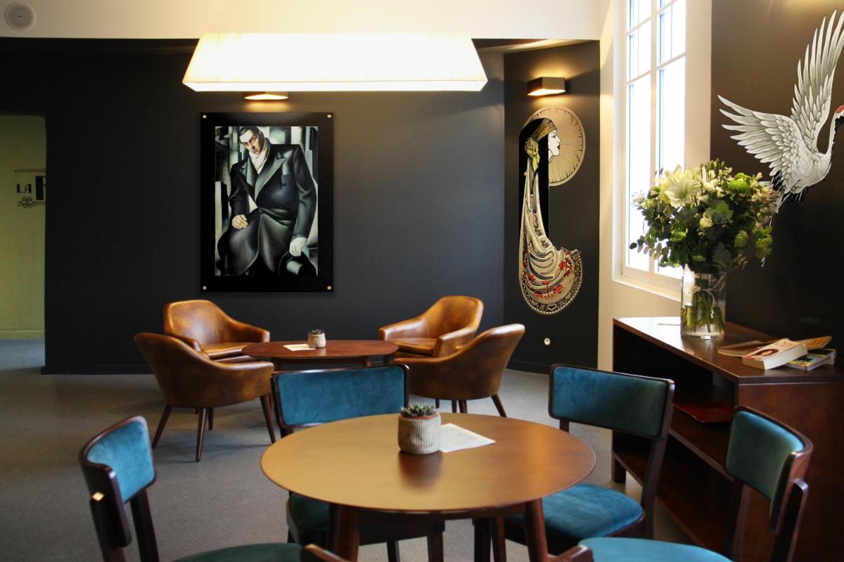 Coin salon dans l'établissement Hôtel du Parc & Spa