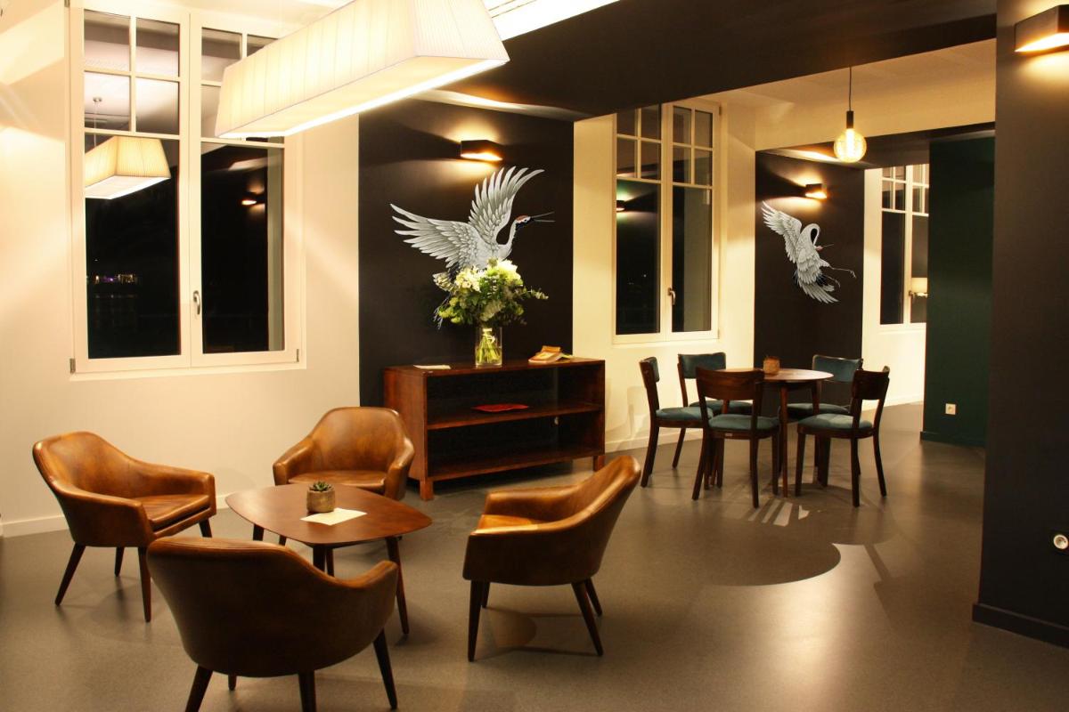 Coin salon dans l'établissement Hôtel du Parc & Spa