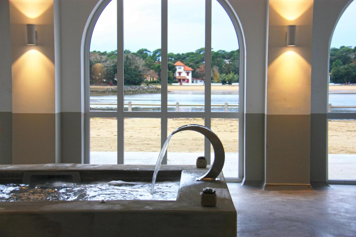 Coin salon dans l'établissement Hôtel du Parc & Spa