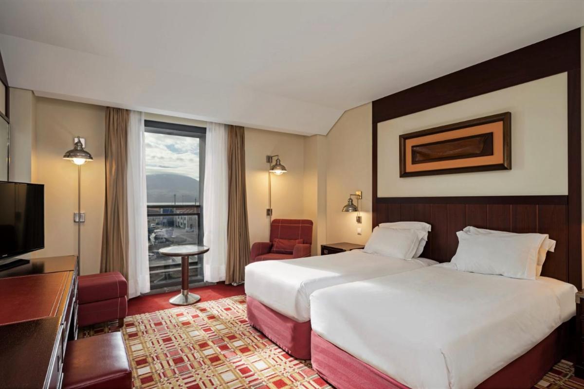 Uma cama ou camas num quarto em Hotel do Canal