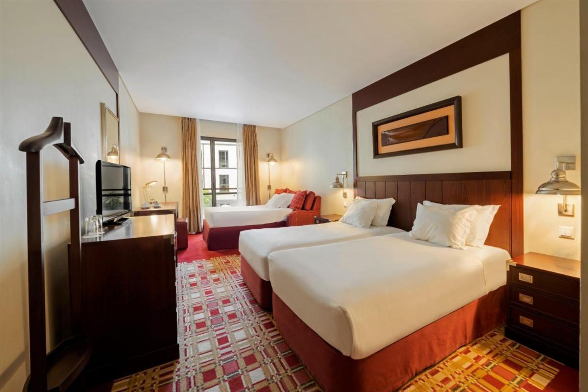 Uma cama ou camas num quarto em Hotel do Canal