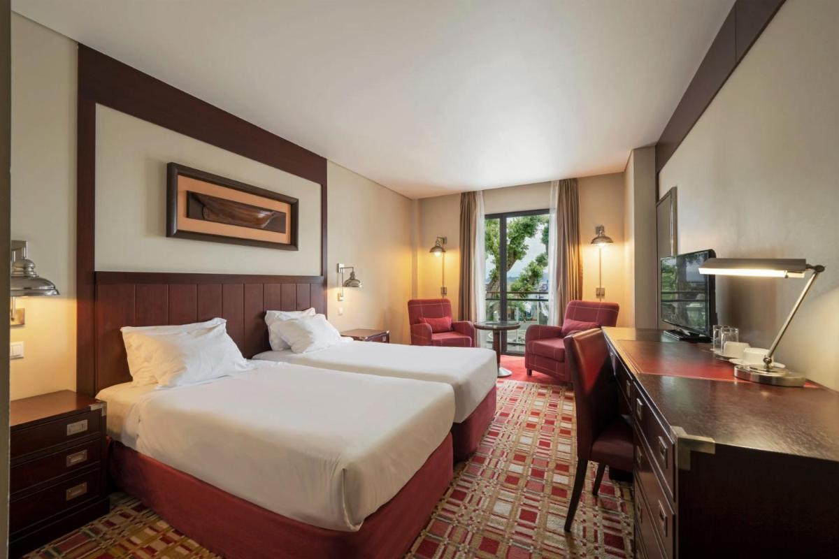 Uma cama ou camas num quarto em Hotel do Canal