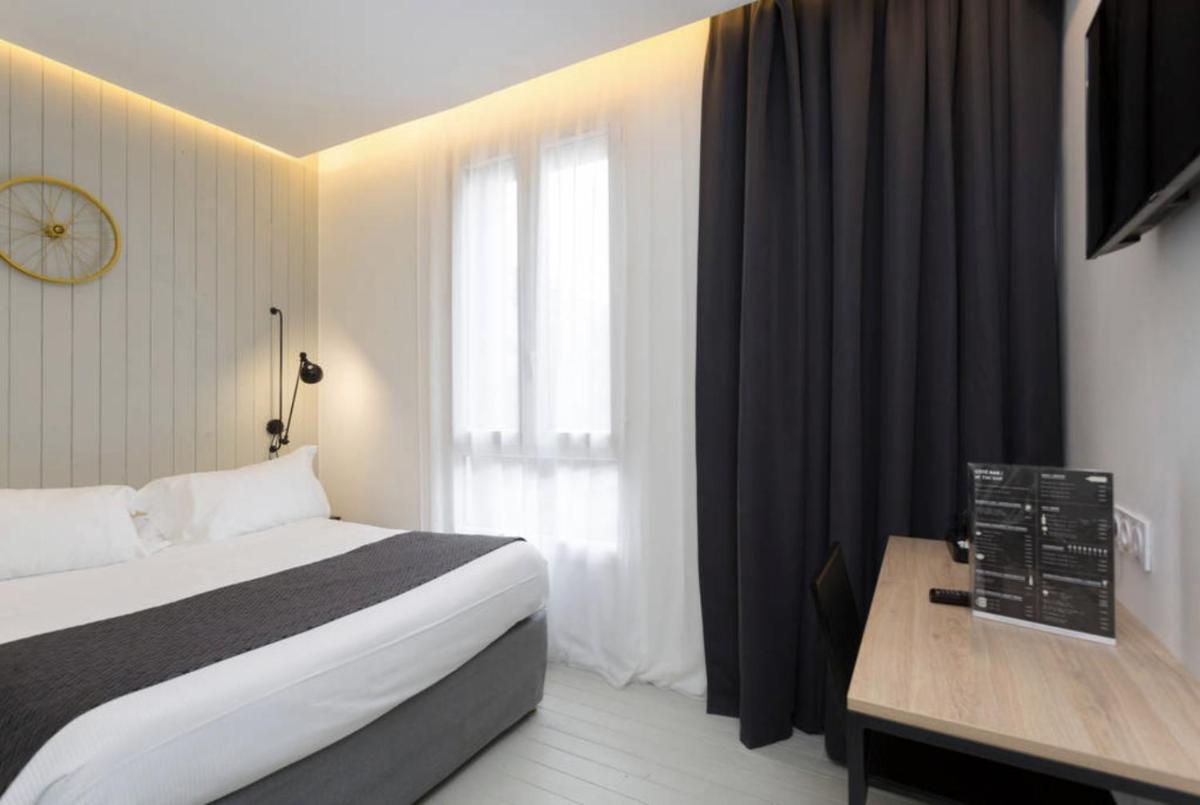 Un ou plusieurs lits dans un hébergement de l'établissement Atypik Hotel