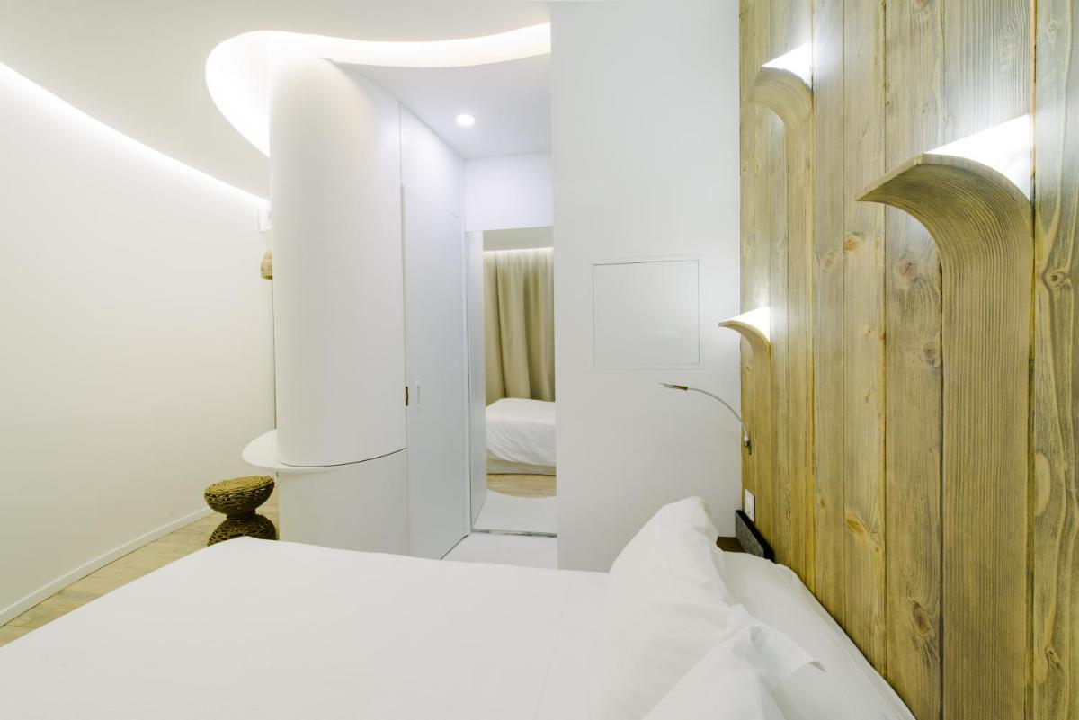 Un ou plusieurs lits dans un hébergement de l'établissement Atypik Hotel