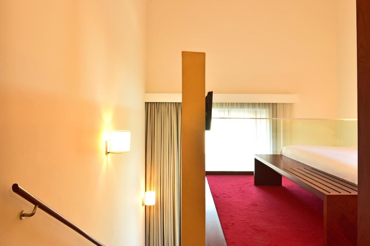 Uma cama ou camas num quarto em Pousada De Viseu
