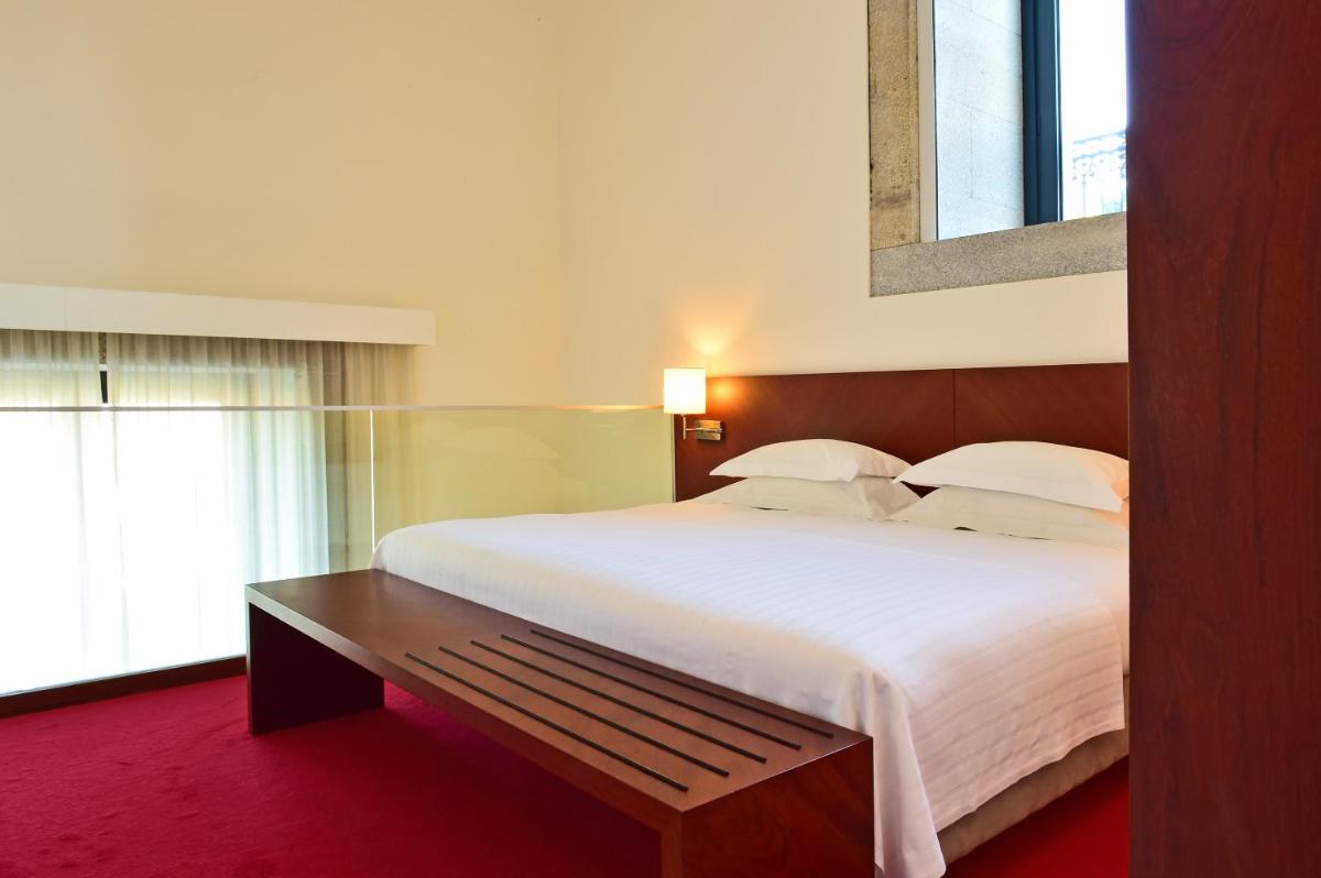 Uma cama ou camas num quarto em Pousada De Viseu