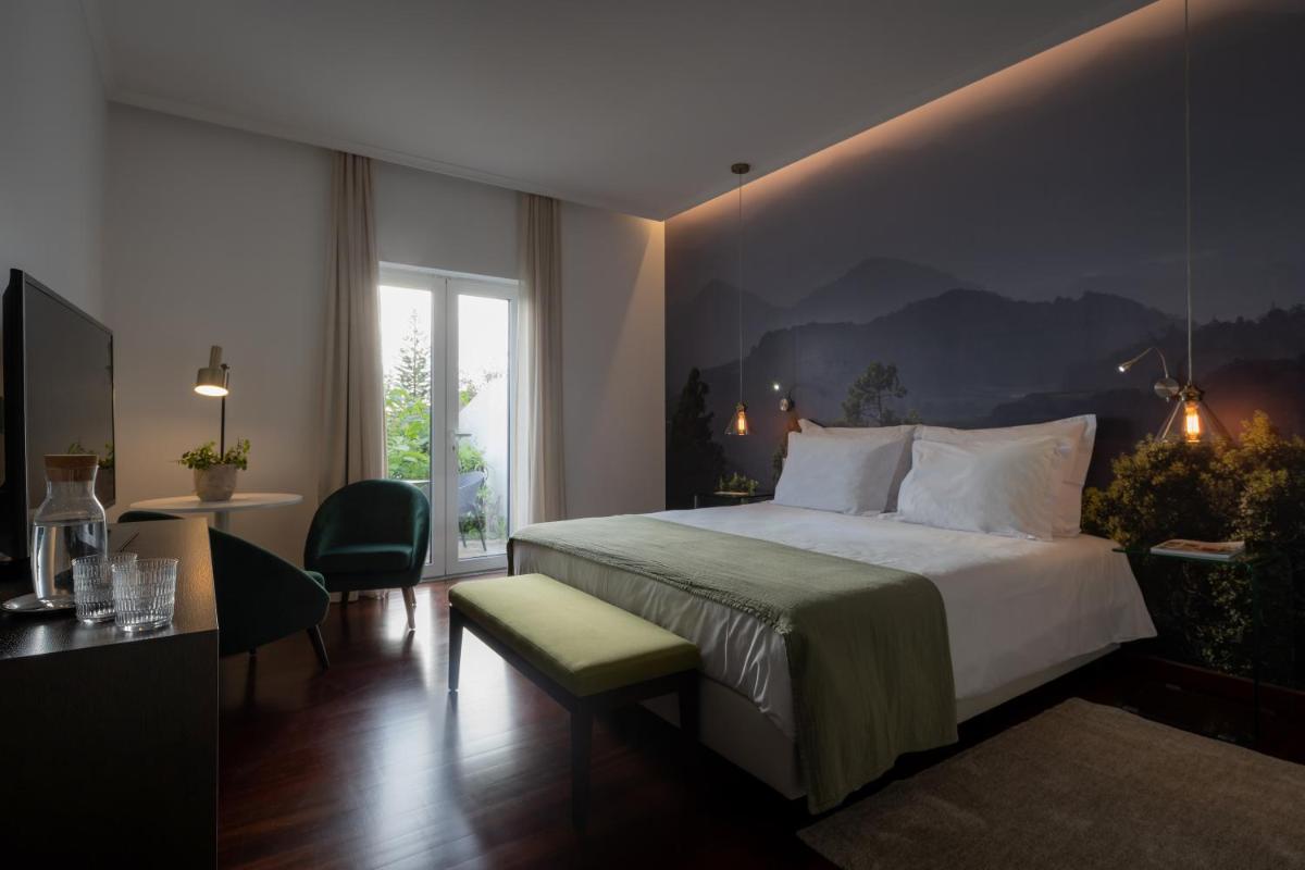 Uma cama ou camas num quarto em Senhora da Rosa, Tradition & Nature Hotel