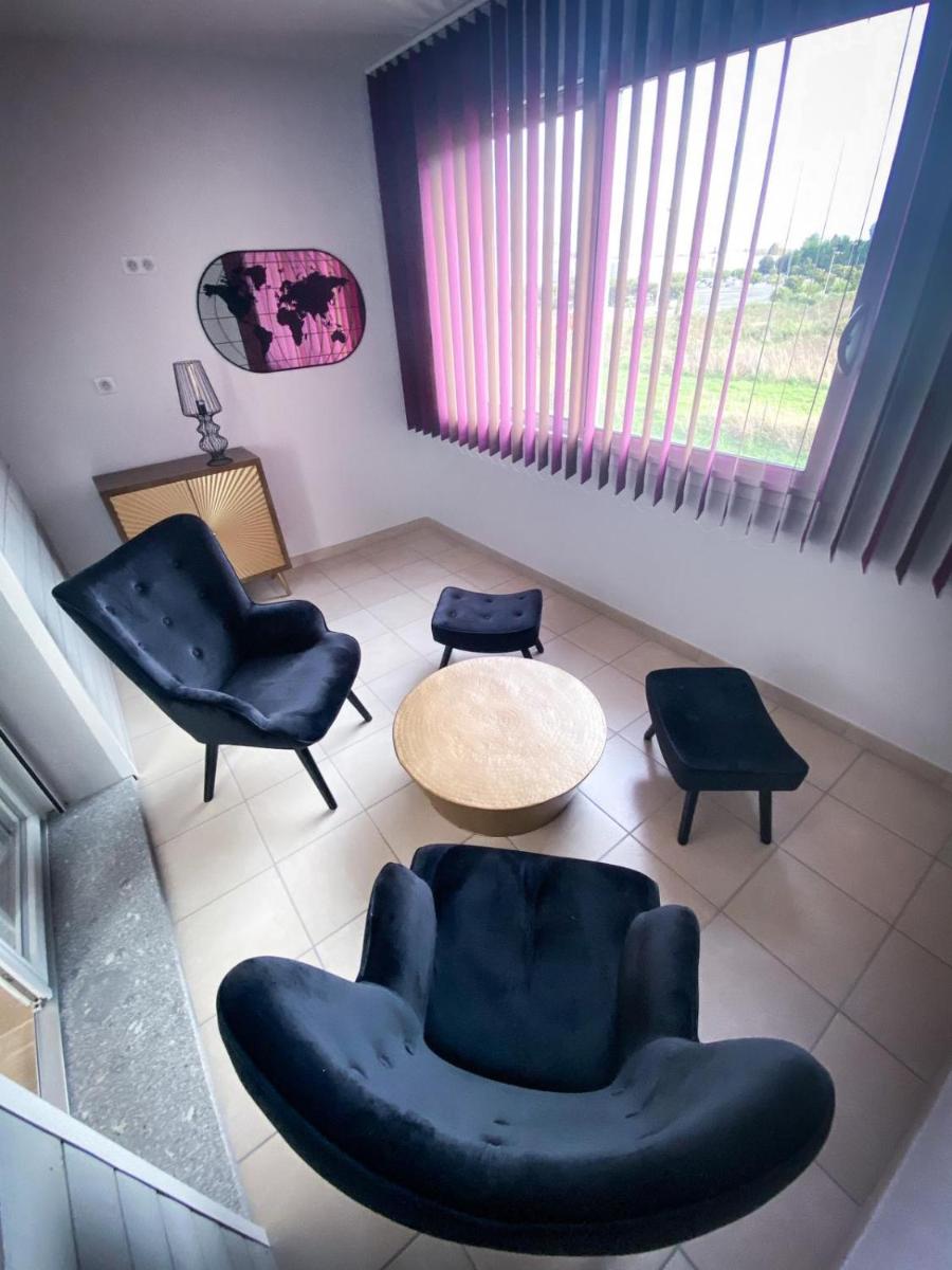 Coin salon dans l'établissement Best Western Hotel & SPA Pau Lescar Aeroport