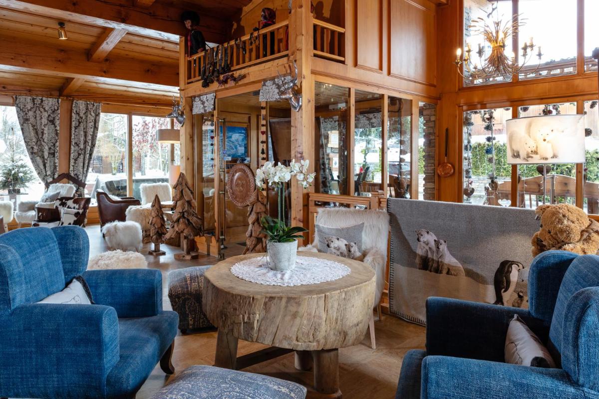 Coin salon dans l'établissement Chalet-Hôtel Neige et Roc, The Originals Relais