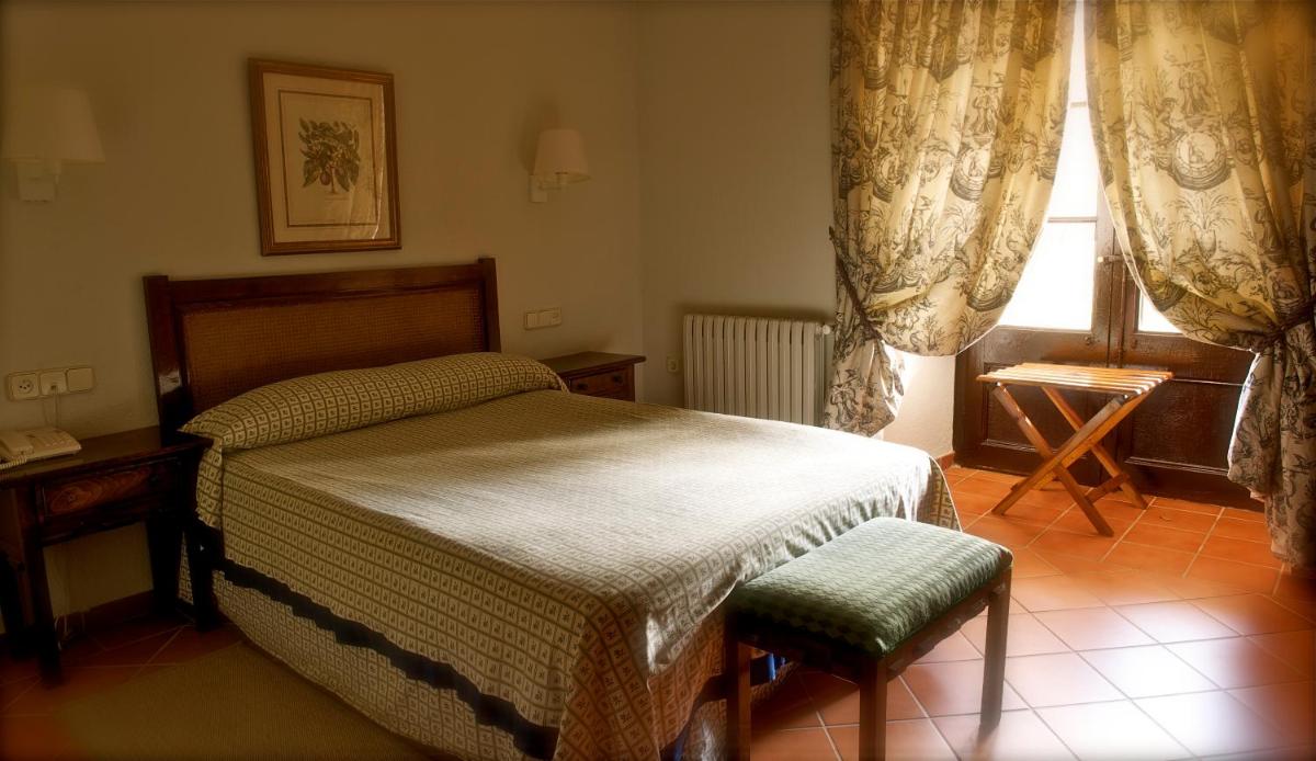 Cama o camas de una habitación en Monasterio De Piedra