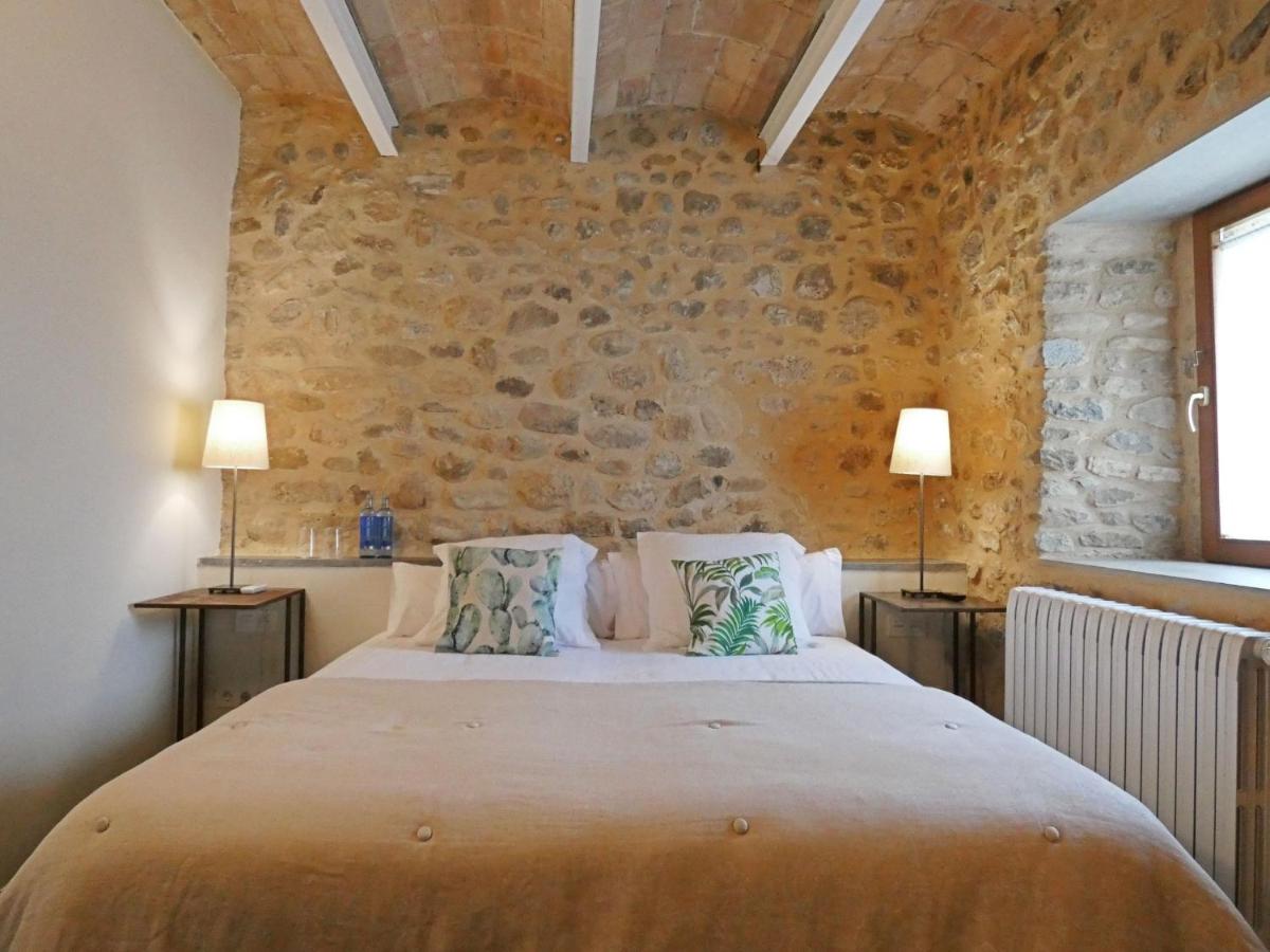 Cama o camas de una habitación en Casa Anamaria Hotel
