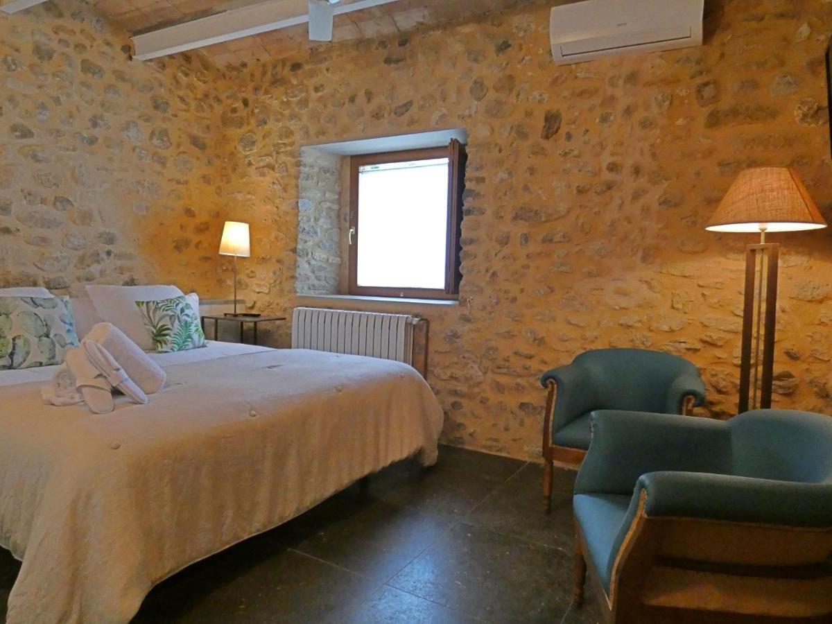Cama o camas de una habitación en Casa Anamaria Hotel