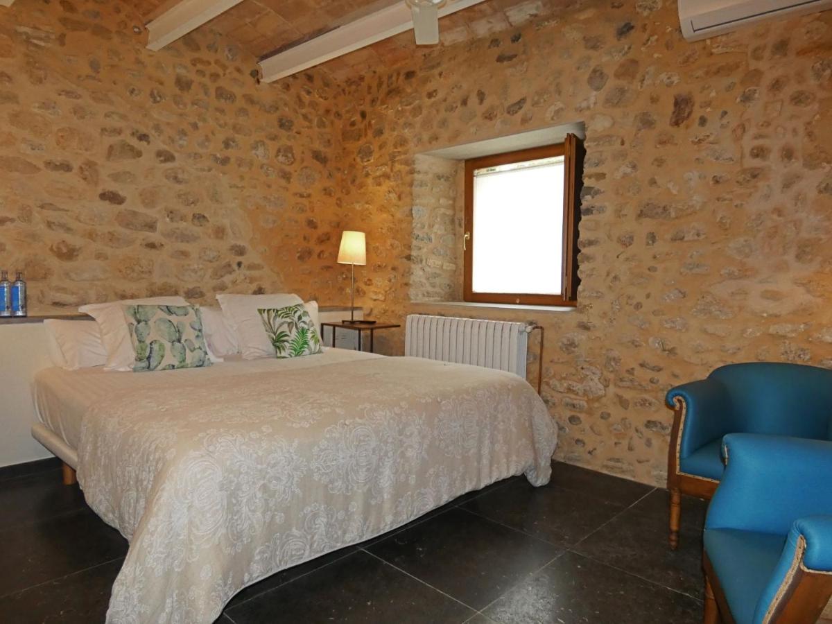 Cama o camas de una habitación en Casa Anamaria Hotel