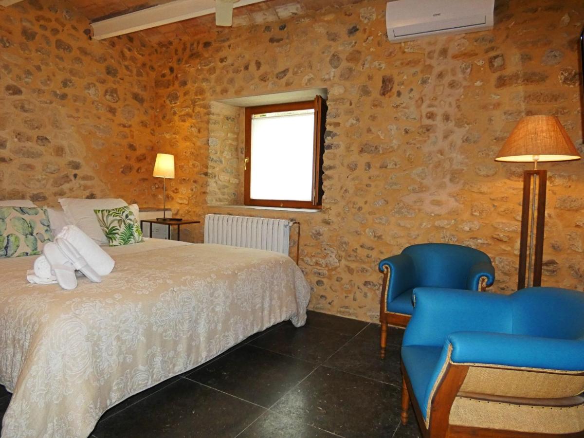 Cama o camas de una habitación en Casa Anamaria Hotel