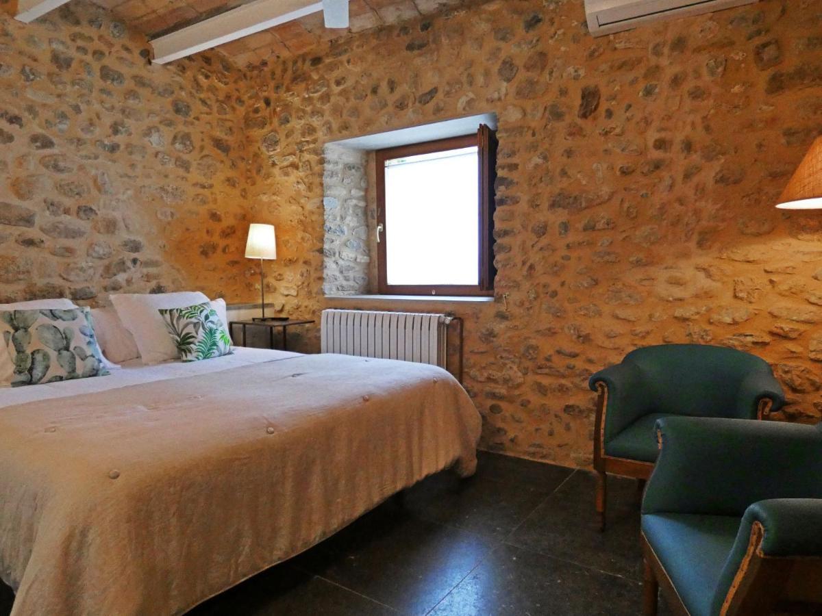 Cama o camas de una habitación en Casa Anamaria Hotel
