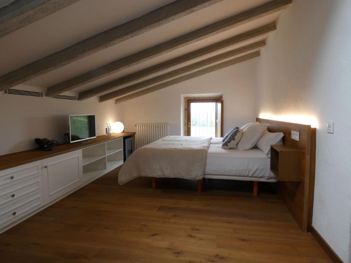 Cama o camas de una habitación en Casa Anamaria Hotel