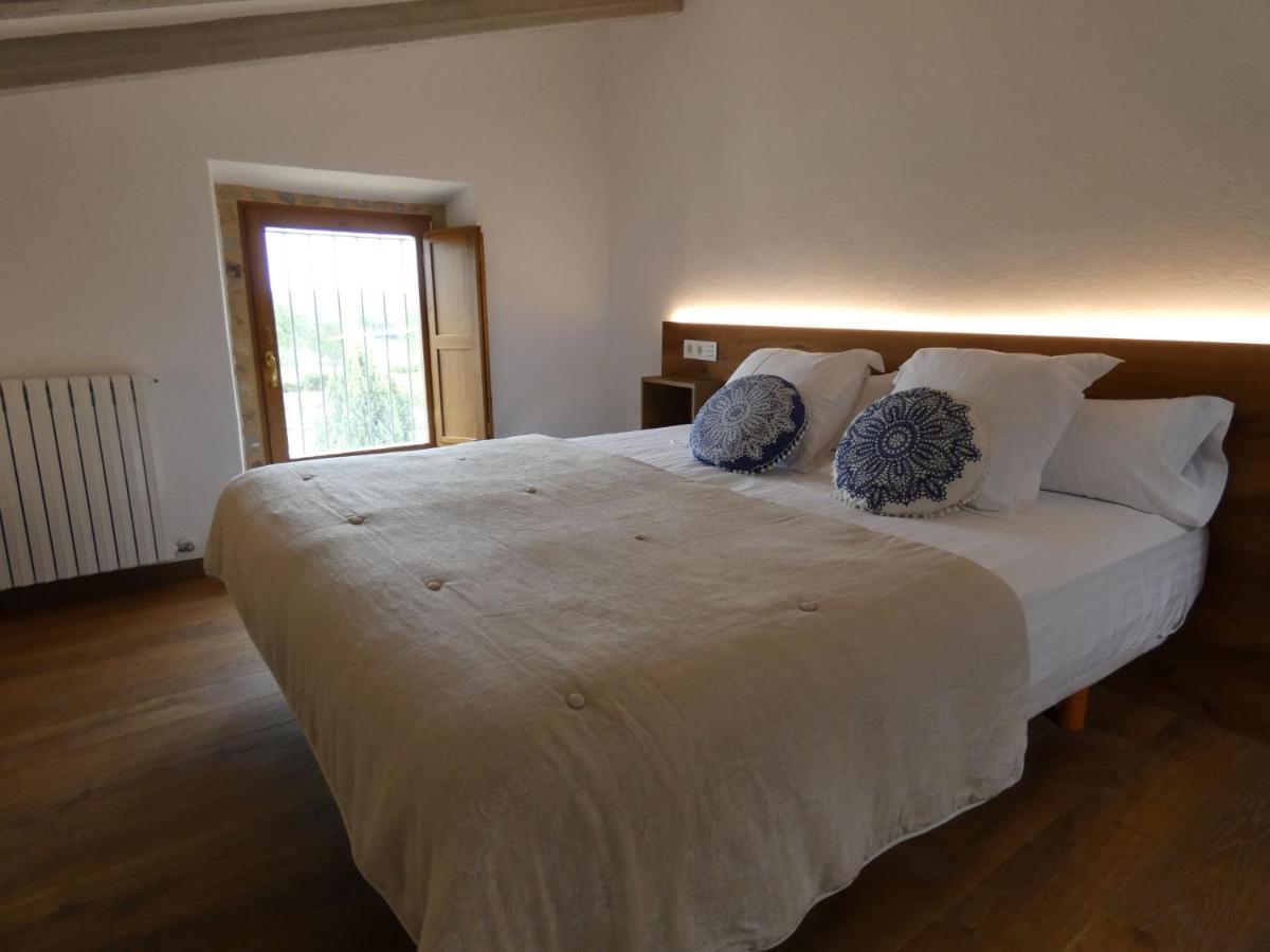 Cama o camas de una habitación en Casa Anamaria Hotel