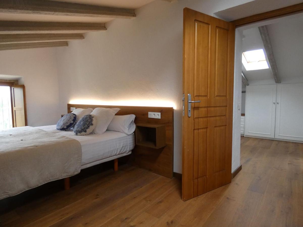 Cama o camas de una habitación en Casa Anamaria Hotel